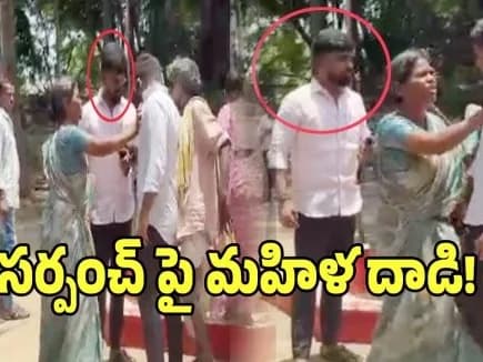 కాలర్ పట్టుకుని సర్పంచ్పై మహిళ దాడి