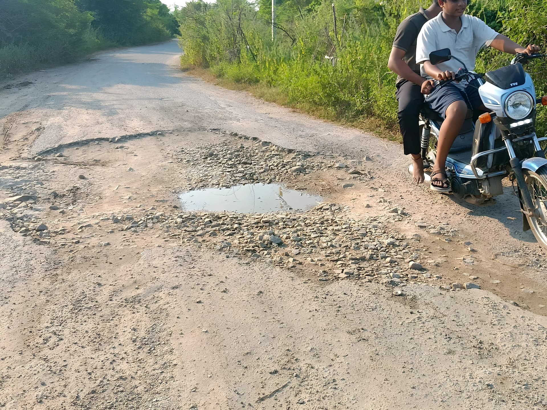 గుంతల రోడ్డుతో గ్రామస్తుల అవస్థలు